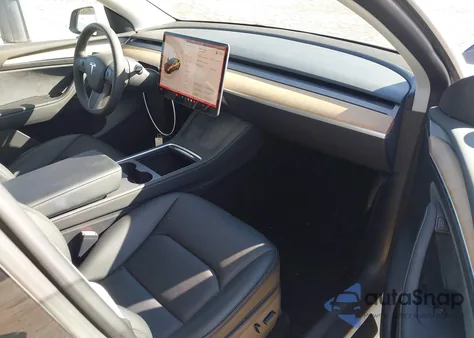 2023 Tesla Model Y Awd/Long Range Dual Motor All-Wheel Drive z USA, uszkodzony, nr VIN 7SAYGDEE2PA051411